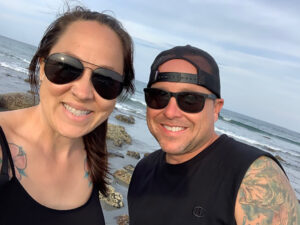 Dale and Laura walking the beach