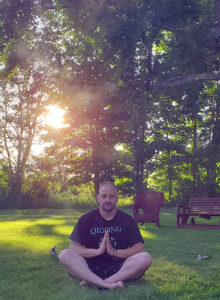 Joey practicing Qi Gong at Malley Farm