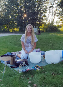 Leah practicing sound healing at Malley Farm