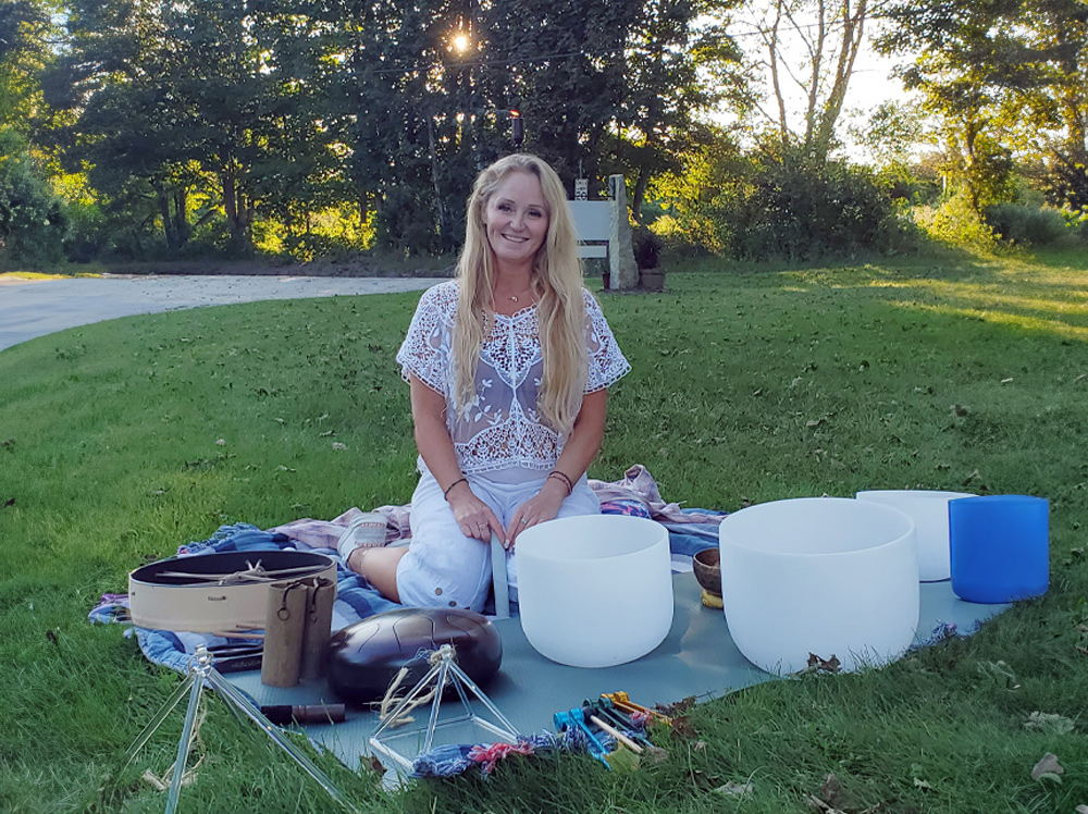 Leah practicing sound healing